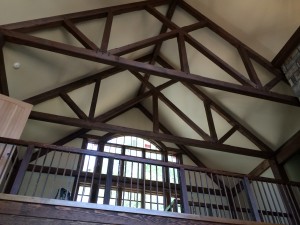Heavy timber custom trusses. This timber truss was designed with custom webbing. The Reserve at Lake Keowee
